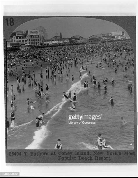 People Crowd At Beach And Water Park Photos And Premium High Res