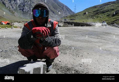 June 27 2022 Ladakh Jammu And Kashmir India A Worker Looks On As