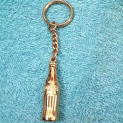 Coca Cola Gold Key Chain Hobbies Toys Memorabilia Collectibles