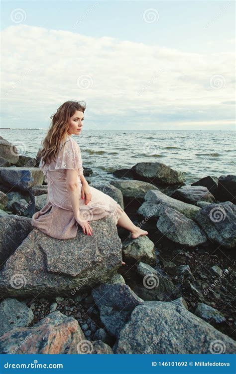 Beautiful Young Woman Relaxing On Ocean Coast Romantic Beauty Portrait