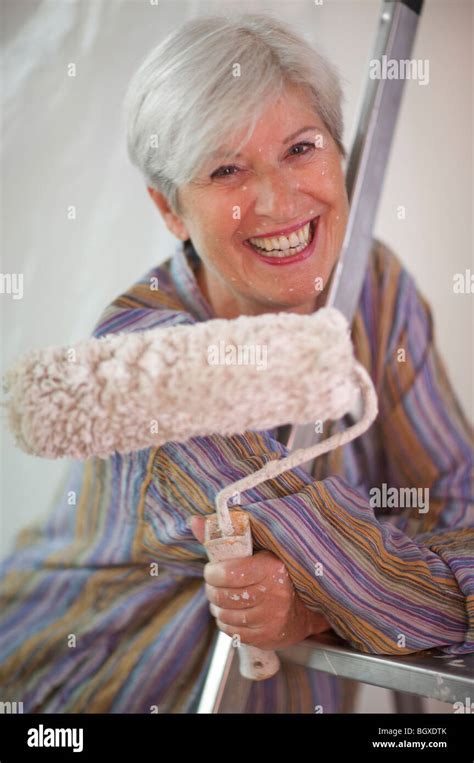 Mature woman doing diy hi-res stock photography and images - Alamy