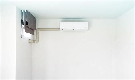 Premium Photo | Air conditioner on white wall
