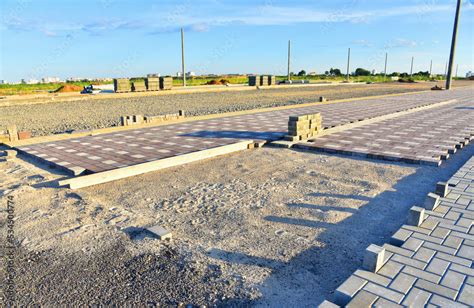 Paving Bricks At Construction Site Laying Paving Slabs And Borders In