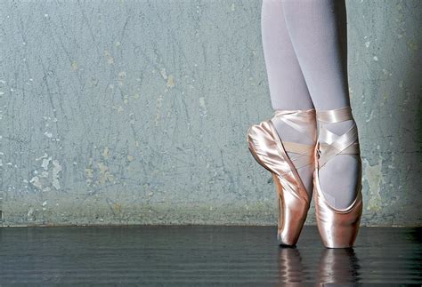 Ballet Dancers On Pointe Feet