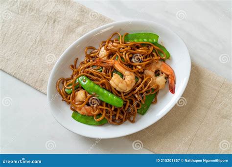 Stir Fried Yakisoba Noodles With Green Peas And Shrimps Stock Image