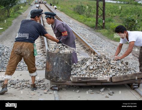 North Korean Men Working On Railways, Hamhung, North Korea Stock Photo ...