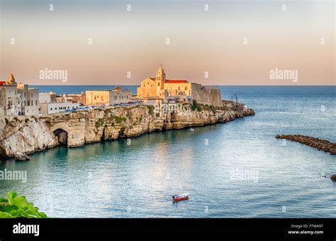 Vieste in Italy, an old Town on sea cliff and beaches: ancient houses and church Stock Photo - Alamy