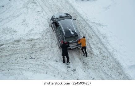 804 Pushing Car Out Snow Images, Stock Photos & Vectors | Shutterstock