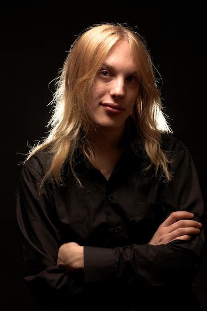 Premium Photo Young Man With Long Blond Hair