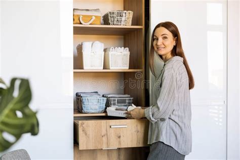 Smiling Female Putting Clothes Wardrobe Comfortable Vertical Storage