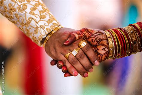 Traditional Indian Wedding Ceremony Groom Holding Hand In Bride Hand