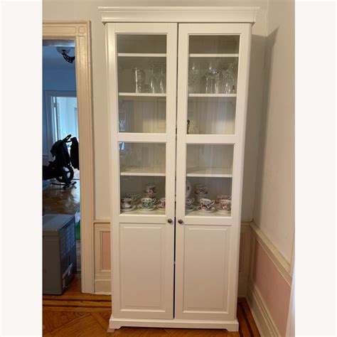 Ikea Liatorp Bookcase With Glass Doors In White Aptdeco