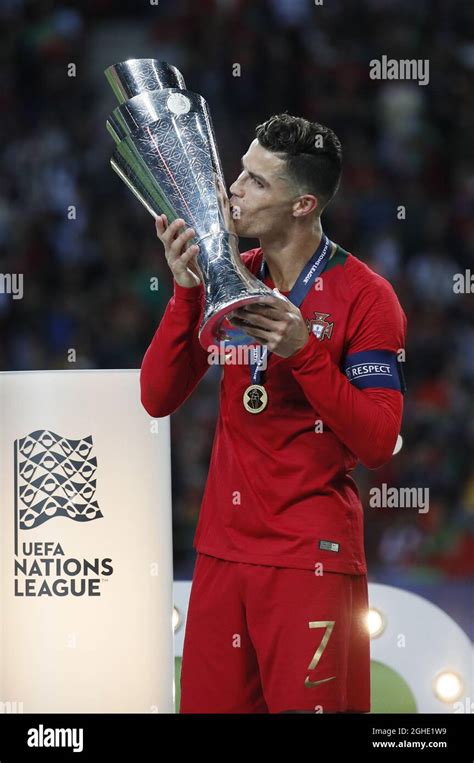 Cristiano Ronaldo Of Portugal Kisses The Nations League Trophy During