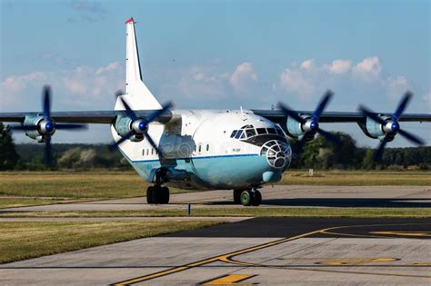 Cavok Air Antonov An Cargo Plane At Airport Apron With Marshaller