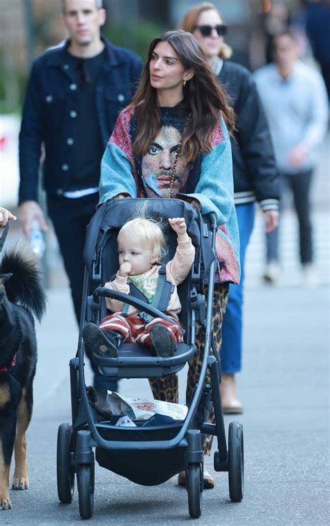 Emily Ratajkowski in an Animal Print Pants Enjoys a Weekend Stroll with