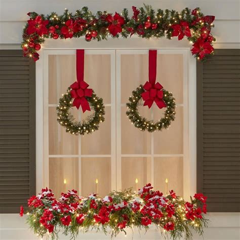 The Cordless Prelit Outdoor Window Wreath Hammacher Schlemmer