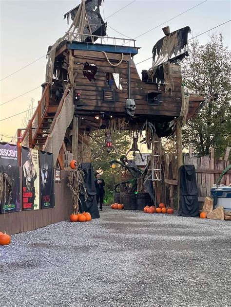 Pumpkins and Scarecrows on the Ground