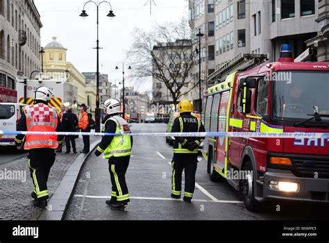 Firefighters Behind A Cordon On The Strand In Central London After Some