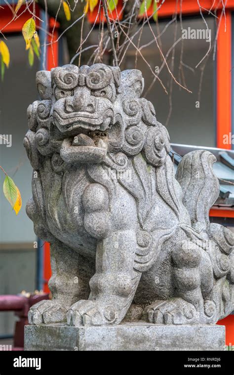 Stone Carved Komainu Lion Dog Guardian At Suzukamyo Shrine Located In