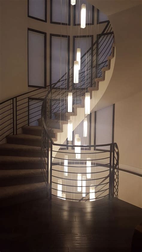 BELLS RESIDENTIAL Foyer Decorating Modern Chandelier Staircase