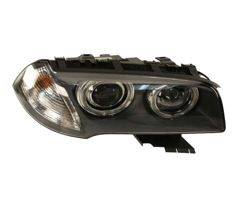 Headlight Assembly Passenger Side Xenon Genuine BMW 63123456044