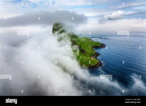 Faroe islands landscape from drone, big cliff and ocean with many ...