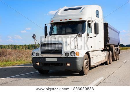 Big Dump Truck Goes On Image & Photo (Free Trial) | Bigstock