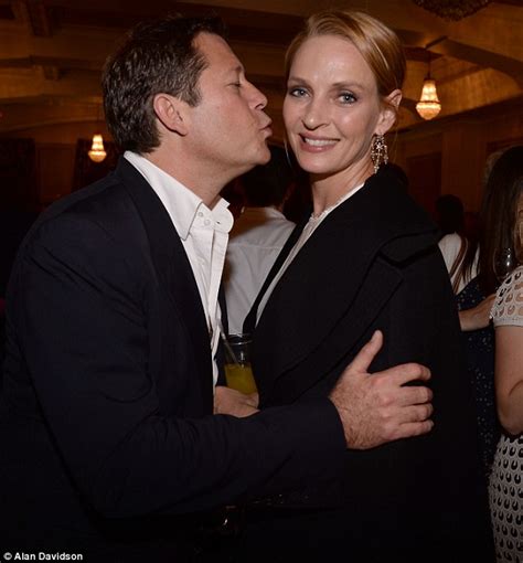 Uma Thurman Kisses Partner Arpad Busson At Charlie And The Chocolate