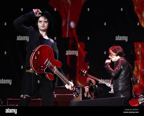 Pete Doherty Left And Carl Barat Of The Libertines Performing On The