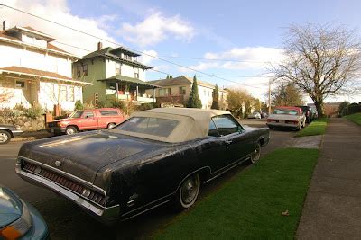 OLD PARKED CARS.: 1969 Mercury Marquis Convertible.