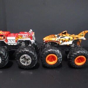 Collection Of 13 Different Hot Wheels 1 64 Scale Monster Trucks Excellent Condition Bigfoot Bone