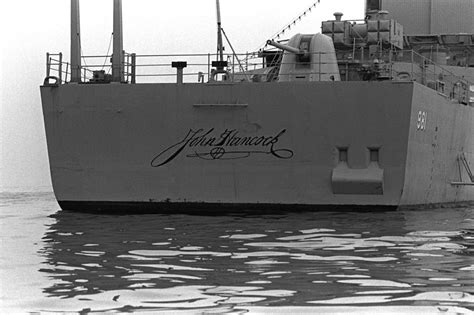 A Stern View Of The Destroyer USS JOHN HANCOCK DD 981 Anchored During