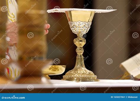 Chalice At The Altar And Priest Celebrate Mass Stock Image Image Of