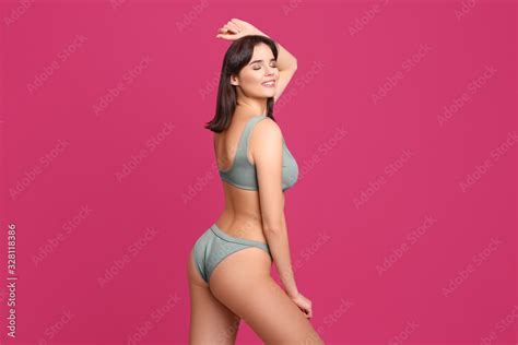 Beautiful Woman In Stylish Bikini On Pink Background Stock Photo Adobe Stock
