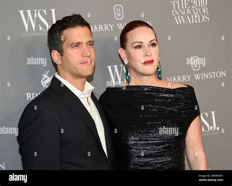 Actress Molly Ringwald, right, and husband Panio Gianopoulo attend the ...