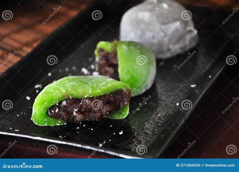 Daifuku Japanese Mochi Stuffed With Sweet Red Bean Filling On Black