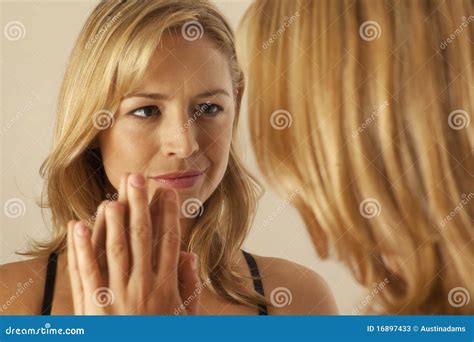 Woman Touching Mirror While Looking At Reflection Stock Image Image