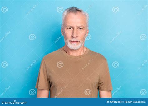 Portrait Of Handsome Confident Serious Man With Gray Hair Beard Dressed