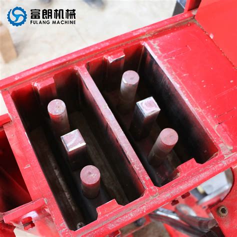 Low Price Manual Mud Clay Interlocking Bricks Block Making Machine