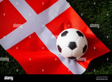 Denmark National Football Team National Flag On Green Grass And Soccer