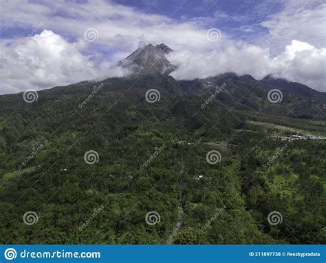 Aerial View Of Mount Merapi Landscape With Rice Field And Village In