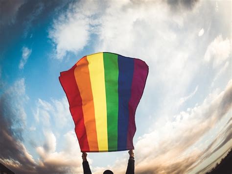 Premium Photo Gay Flag Against Blue Sky Lgbt And Pride