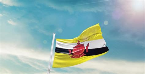 Premium Photo Brunei National Flag Waving In Beautiful Sky