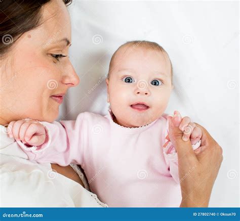 Happy Mother Lying With Her Baby Infant Girl Stock Photo Image Of