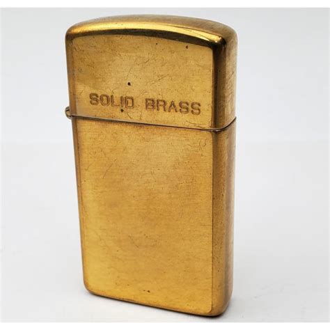 Sold at Auction: Vintage Solid Brass Zippo Lighter