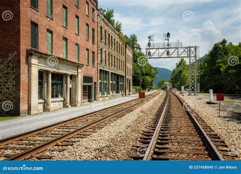 Railroad Tracks And Historic Buildings In Thurmond A Ghost Town In The