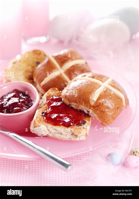 Hot Cross Buns With Jam Stock Photo Alamy
