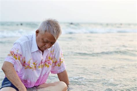 Old Man Sits On The Beach Stock Image Image Of Asian 69982397