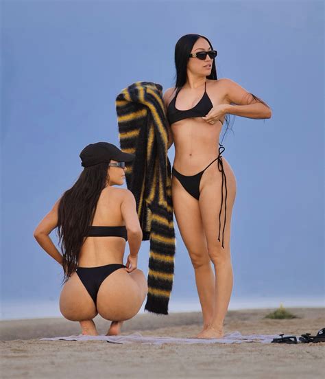 Kim Kardashian Shows Off Bare Butt In Tiny Black Thong Bikini As She