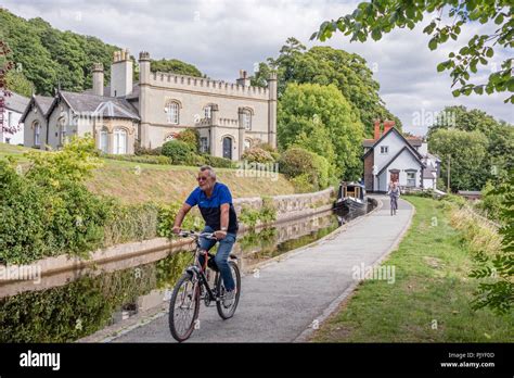 Boating and cycling on the Llangollen Canal near Llangollen, Wales, UK ...